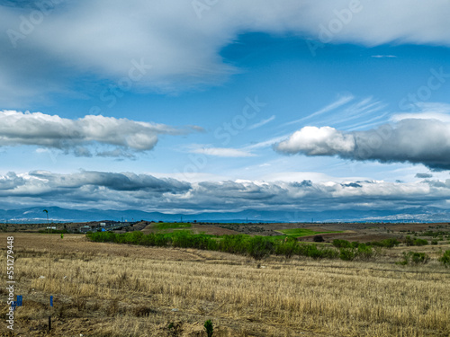 clouds over the field photo