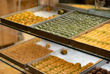 Traditional Turkish dessert baklawa in different flavors and styles in the Egyptian bazaar in Istanbul. Dessert shop at grand bazar baklava ramadan
