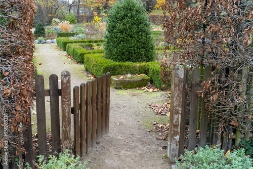 fence with wooden gate in a garden