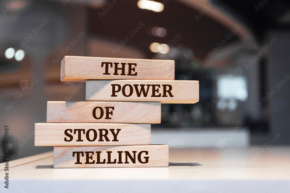 Wooden blocks with words 'THE POWER OF STORYTELLING'.