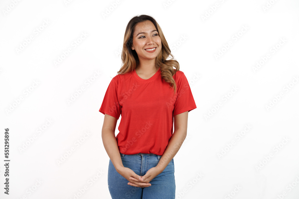 Studio shot of pretty Asian woman with red t-shirt isolated on white background. Looking blank area Studio shot of pretty Asian woman with red t-shirt isolated on white background. Looking blank area