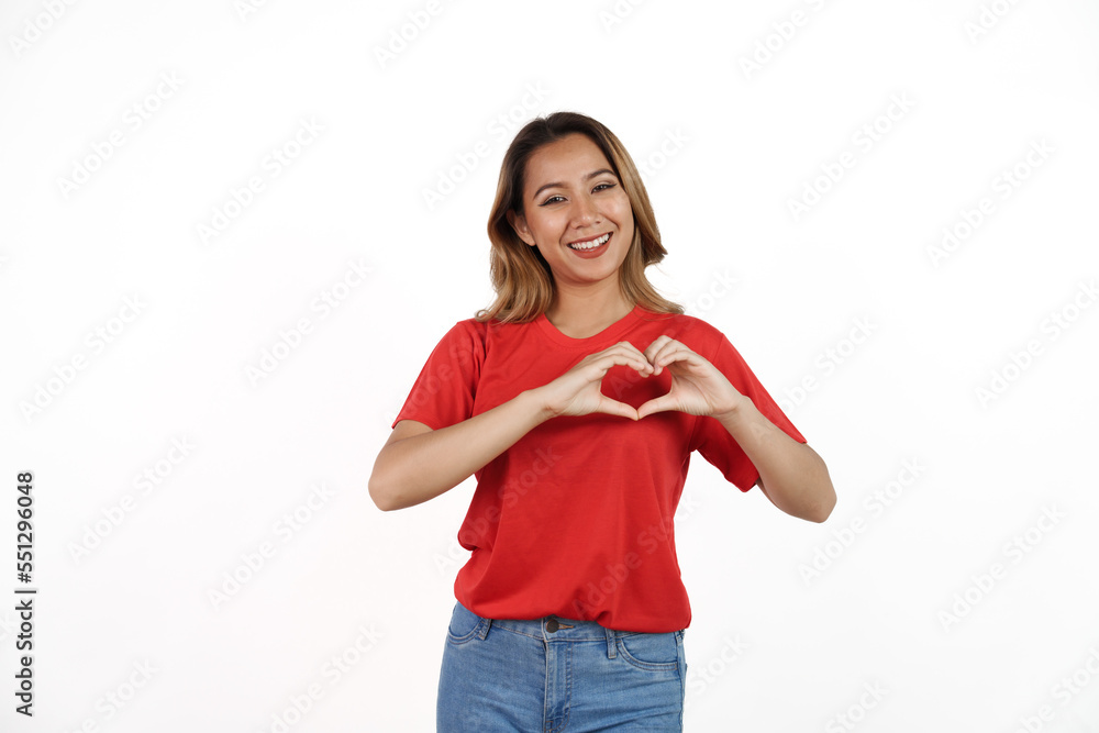 Studio shot of pretty Asian woman with red t-shirt isolated on white background. Heart shape Studio shot of pretty Asian woman with red t-shirt isolated on white background. Heart shape