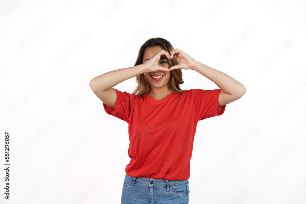 Studio shot of pretty Asian woman with red t-shirt isolated on white background. Heart shape Studio shot of pretty Asian woman with red t-shirt isolated on white background. Heart shape