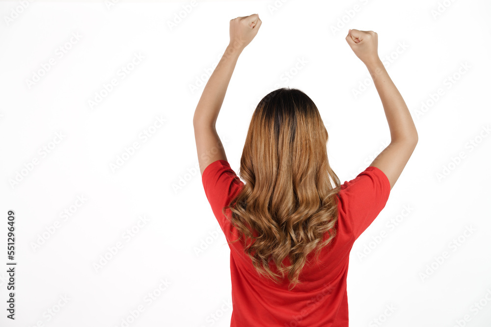 Studio shot of female asian soccer fans with red t-shirt isolated on white background. rear or back view Studio shot of female asian soccer fans with red t-shirt isolated on white background. rear or back view