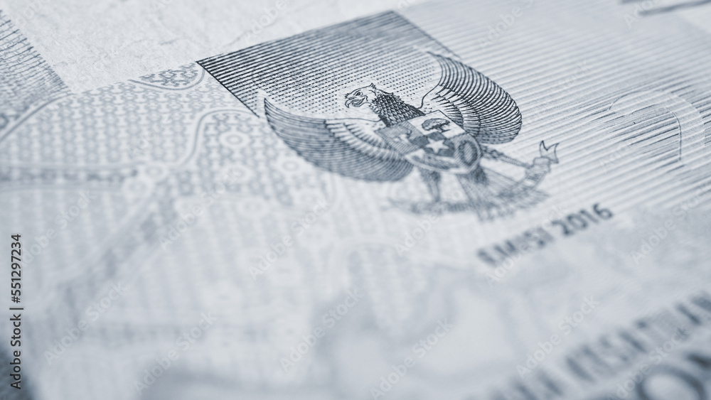 Indonesian money. Fragment of 2000 rupiah bill. Photo is partially ...