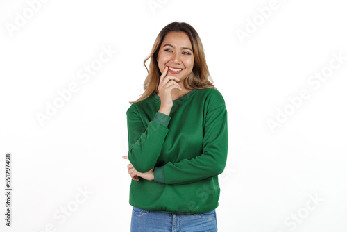 Attractive beautiful asian woman in green sweater isolated on white background. © NanSan