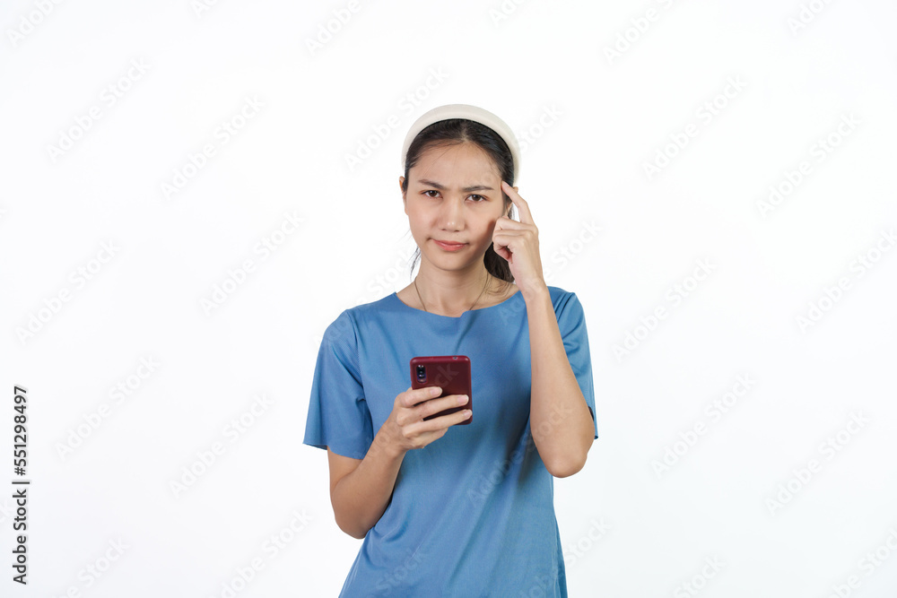 Beautiful Asian woman in blue t-shirt isolated on white background. Holding cellphone Beautiful Asian woman in blue t-shirt isolated on white background. Holding cellphone