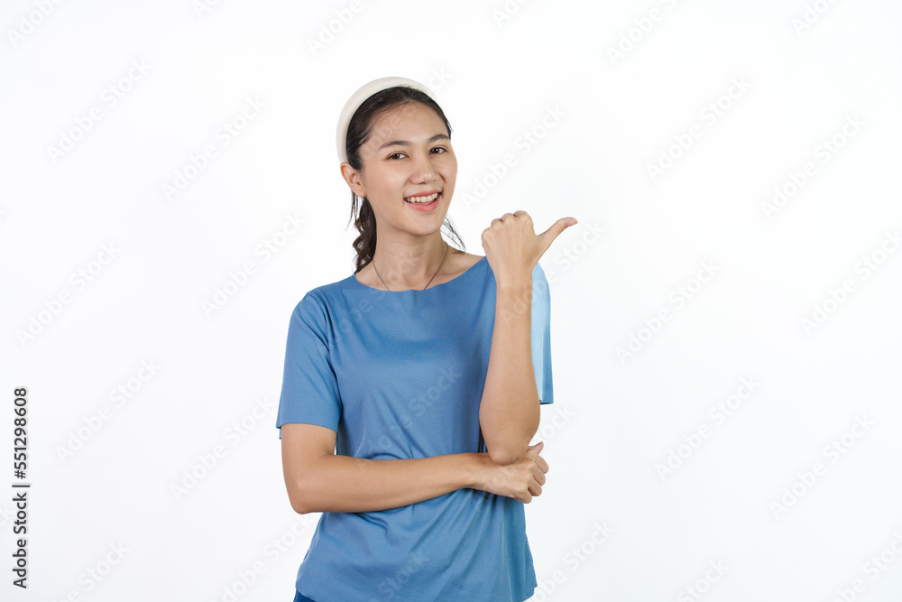 Beautiful Asian woman in blue t-shirt isolated on white background. Hands pointing for advertise or discount Beautiful Asian woman in blue t-shirt isolated on white background. Hands pointing for advertise or discount