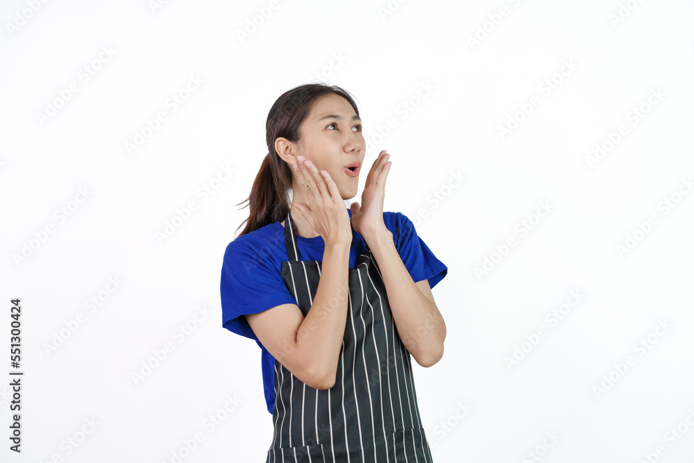 Excited asian coffee shop SME owner asian woman wearing blue t-shirt and black apron isolated on white background. Surprise, win, yes Excited asian coffee shop SME owner asian woman wearing blue t-shirt and black apron isolated on white background. Surprise, win, yes