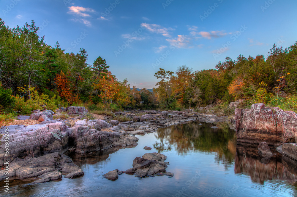A pristine spot along Marble Creek as it cascades thought a marble outcrop at dusk in Madison County Missouri. A pristine spot along Marble Creek as it cascades thought a marble outcrop at dusk in Madison County Missouri.