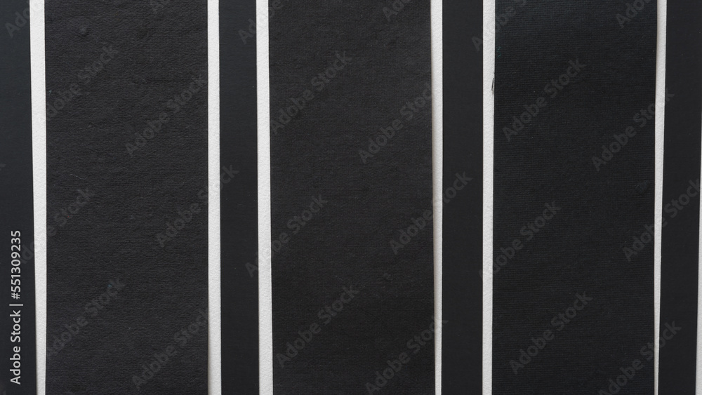 background with black paper bands and stripes
