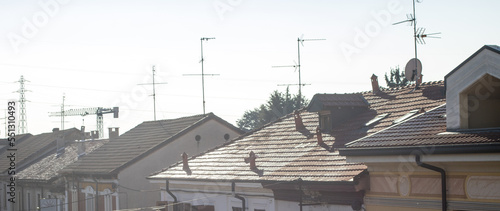 Aerial photo of the roofs of buildings during a winter sunrise