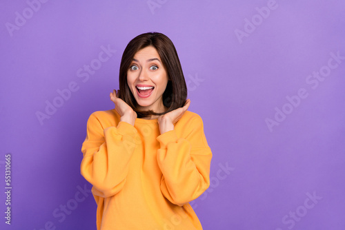Photo of cheerful lady stylish sweater satisfied new hairdress impressed good price service empty space isolated purple color background © deagreez