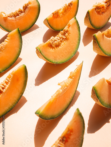 Many slices of a fresh melon on the background, wallpaper