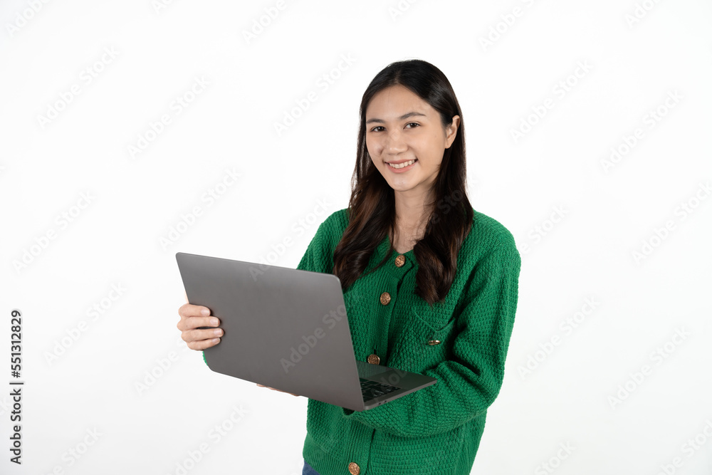 Smiling young woman student holding laptop computer and looking at camera on isolated white background. Pretty lady model with black hair emotionally showing facial expressions in studio. Smiling young woman student holding laptop computer and looking at camera on isolated white background. Pretty lady model with black hair emotionally showing facial expressions in studio.