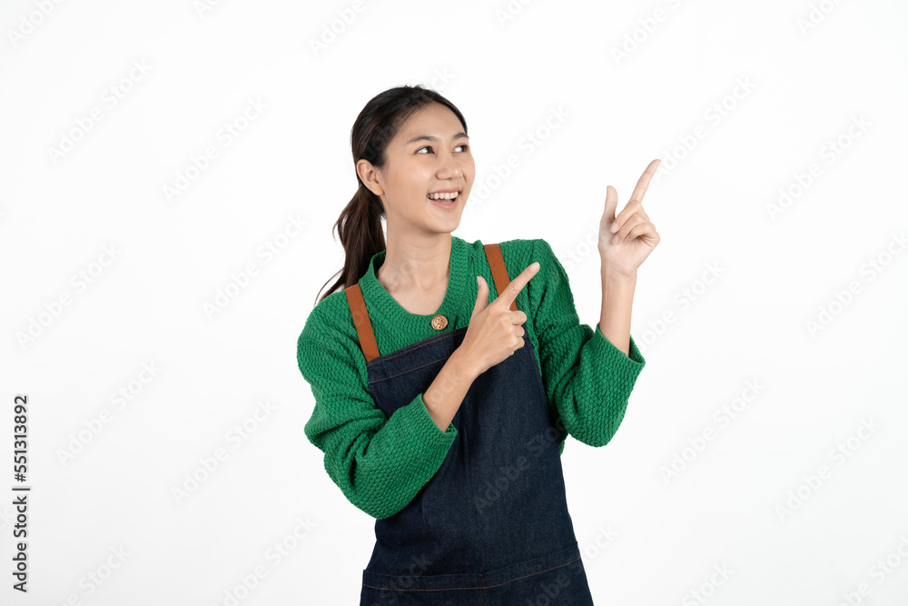 Small shop owner, entrepreneur or sales clerk standing happy and proud wearing apron. Young woman isolated on white background. Small shop owner, entrepreneur or sales clerk standing happy and proud wearing apron. Young woman isolated on white background.