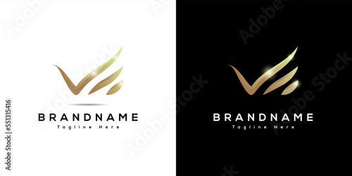 Abstract shape of Letter V elegant gold gradient premium wing hand logo design vector