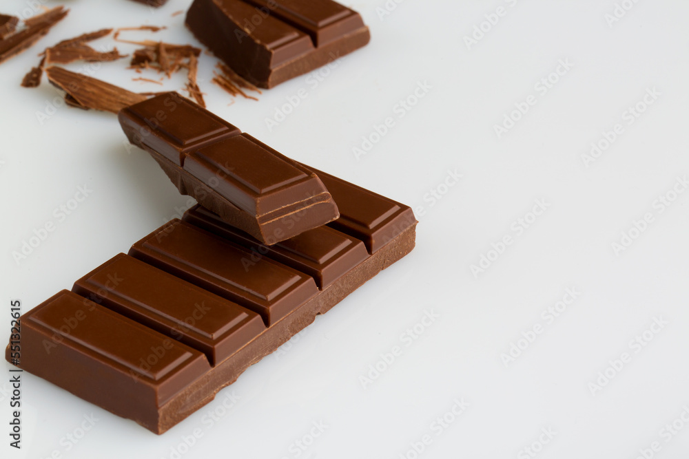 chocolate pieces isolated on white background. Top view