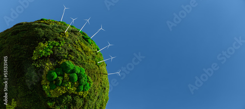 Fototapeta Naklejka Na Ścianę i Meble -  Model of the green planet Earth from moss with wind turbines. Symbol of sustainable development and renewable energy	