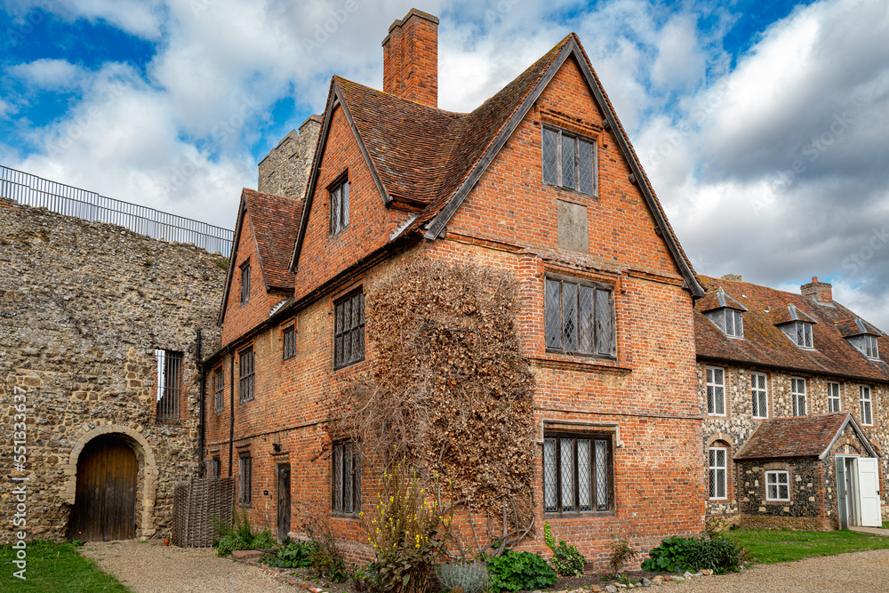 Detailed view of a very old poor house located in the castle walls. The fine architecture is clearly evident in this famous building.