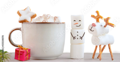 Christmas mug with hot chocolate, marshmallows and red gift box. XMas stars cookies and marshmallow snowman. christmas festive banner with yellow glittering background, copy space for text.