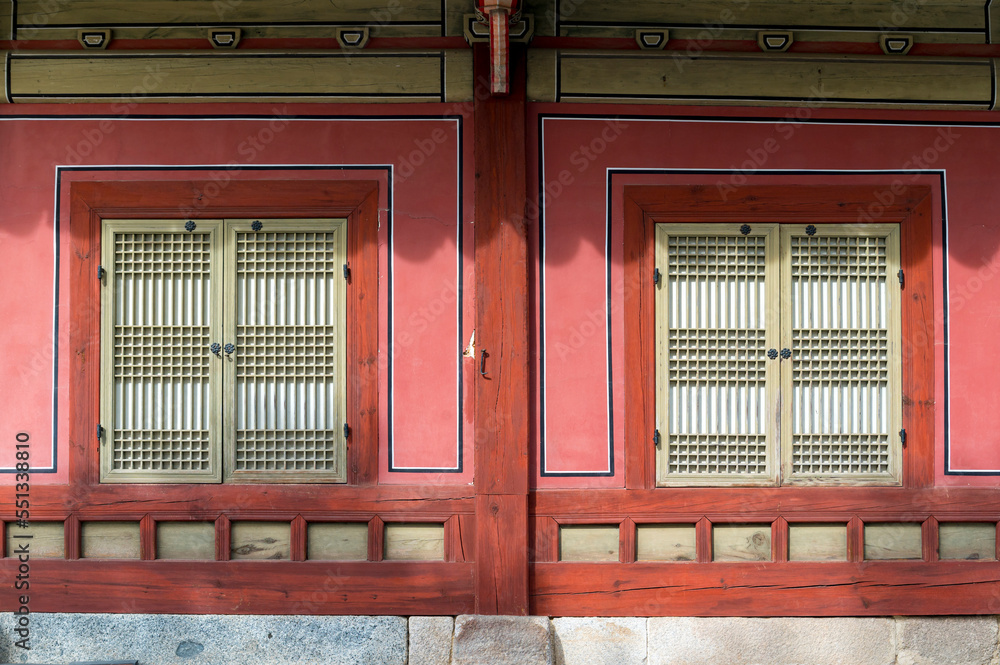 Architectural detail - Korean Tradition Wooden Window, decoration brick wall from ancient korean house in Seoul, South Korea