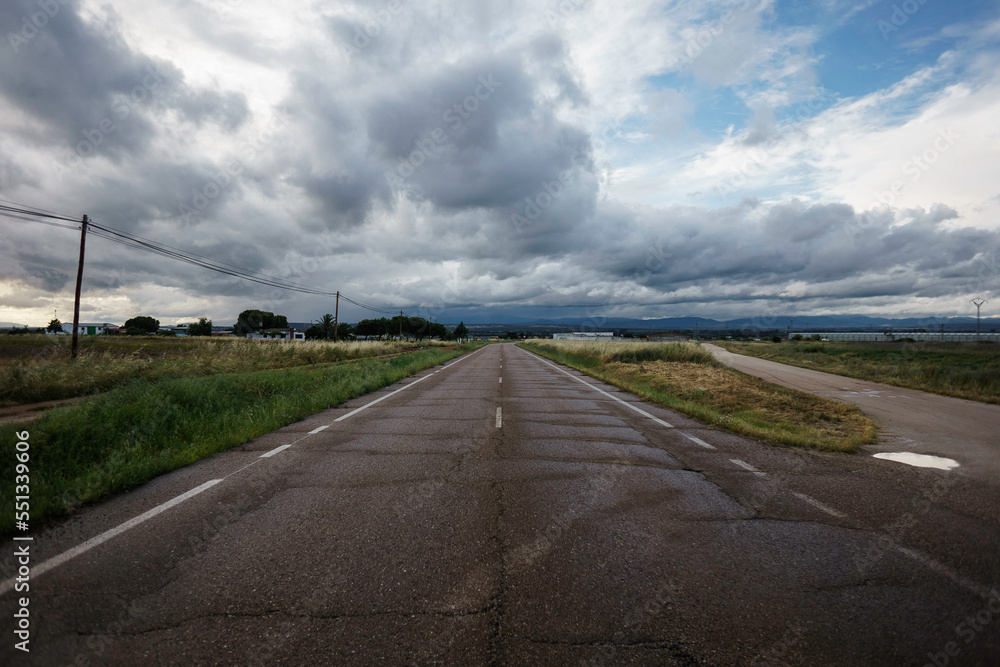 road and cloudy sky
