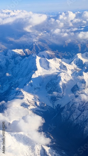 Xinjiang-China blue snow mountain with sun set