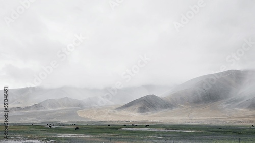 Taxkorgan Tajik Xinjiang -China snow monutain in cloudy day