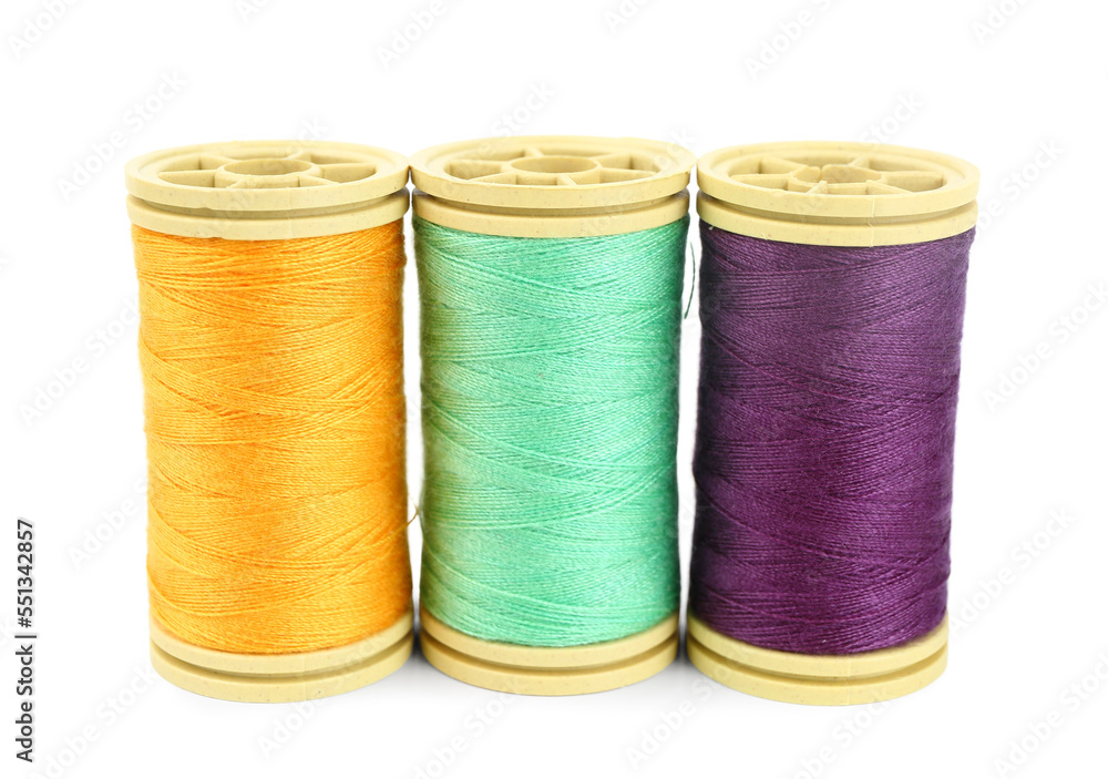 Colorful thread spools isolated on white background Colorful thread spools isolated on white background