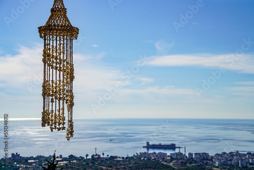 Kız Kalesi in Mersin Turkey with cowrie macrame photo