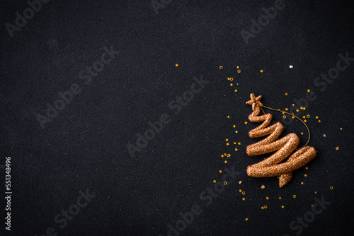Christmas flat lay background with golden fir tree. Top view with copy space.