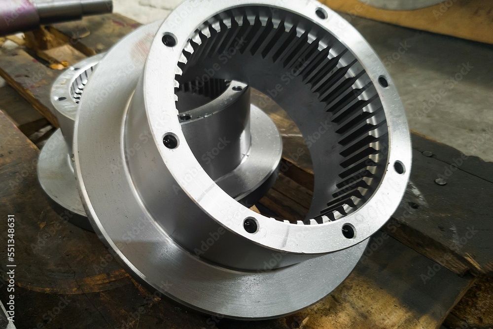 Round gears after turning and milling on the rack closeup. Round gears after turning and milling on the rack closeup.