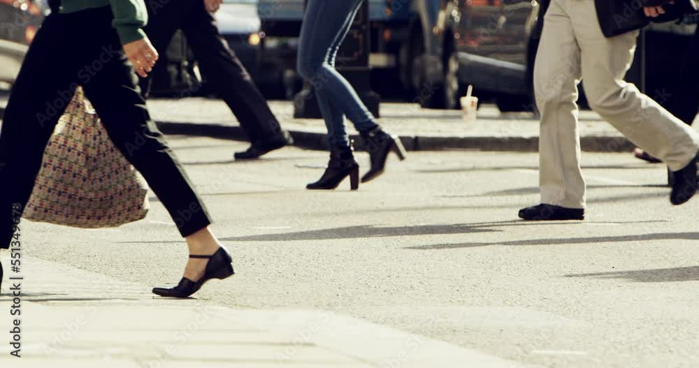 Travel, cross and shoes of business people in city for commute, transportation and traffic. Workforce, journey and walking with crowd of pedestrians in street for working, urban and morning rush Travel, cross and shoes of business people in city for commute, transportation and traffic. Workforce, journey and walking with crowd of pedestrians in street for working, urban and morning rush