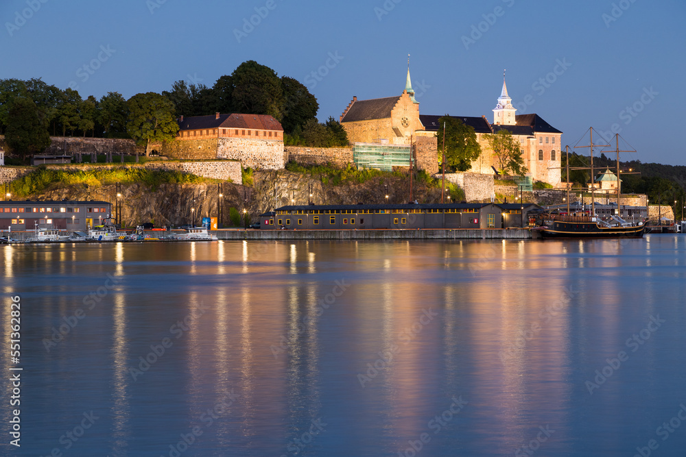 Iluminated Akershus Fortress in Oslo during the blue hour