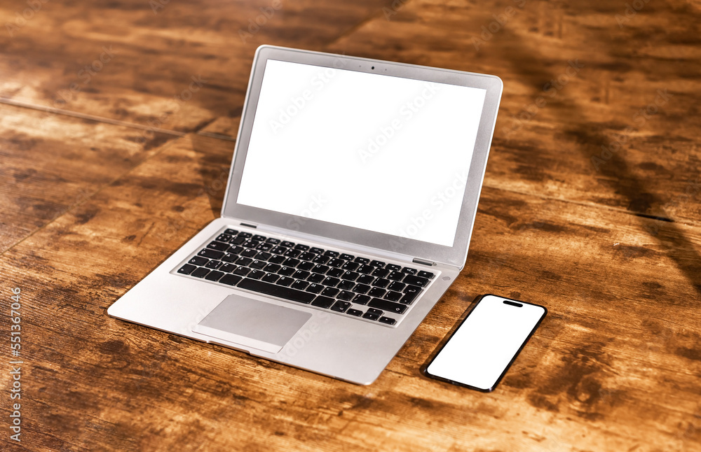 Laptop display and smartphone screen mockups on wood desk, table for application, mobile app and web site ad, promo template Laptop display and smartphone screen mockups on wood desk, table for application, mobile app and web site ad, promo template