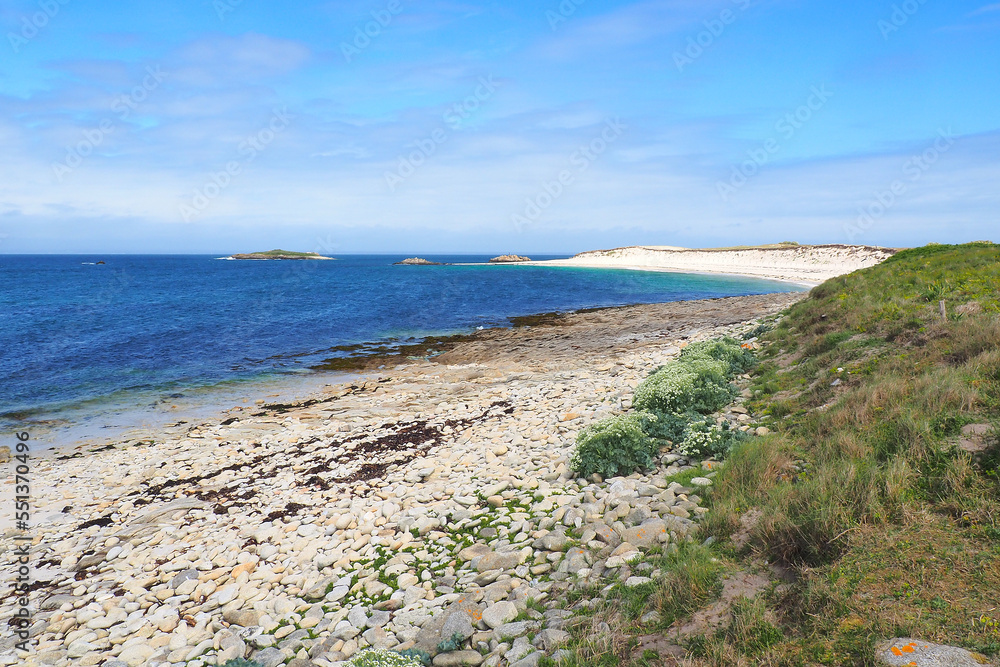 Panoramic view of the beautiful beach of Ile Saint Nicolas, main island of the famous Glénan archipelago located off the Brittany coast of Concarneau in the Morbihan department in western France
