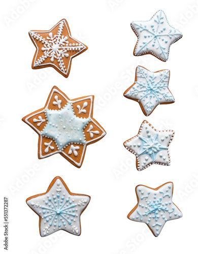 Homemade gingersnaps coverd icing snowflakes and stars cookies. photo