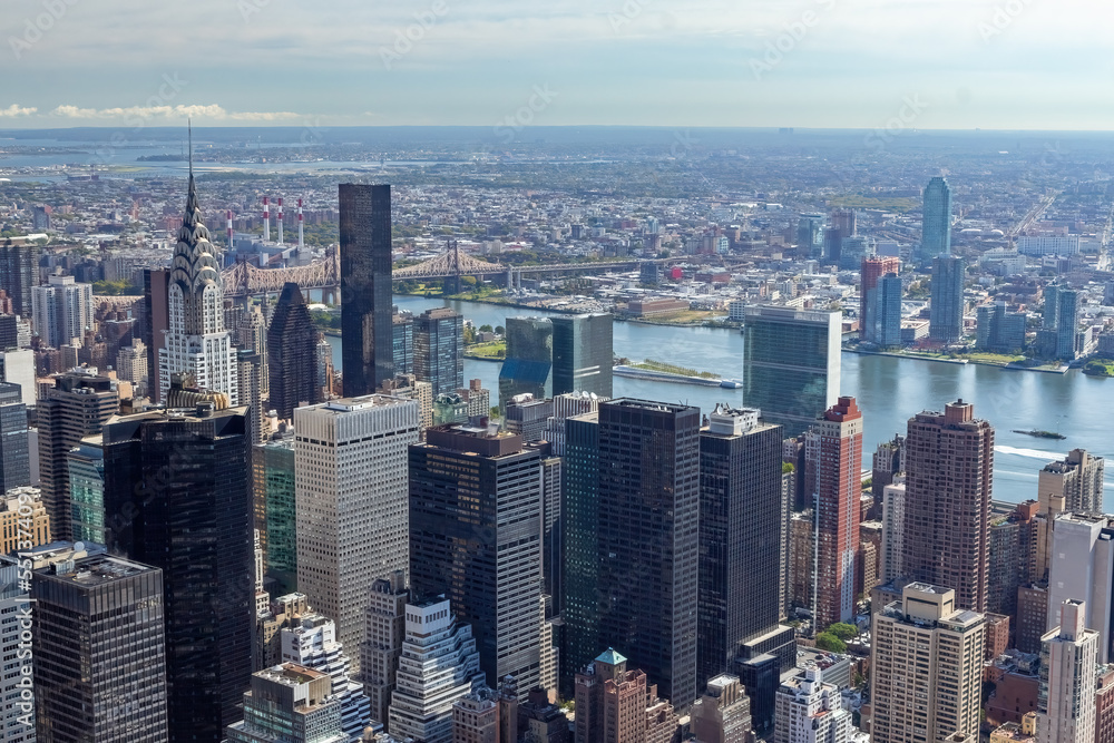Aerial view of  Midtown Manhattan and East River in New York City. Horizontally. 
