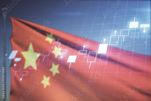 Photography Multi exposure of virtual abstract financial diagram on flag of China and blue s