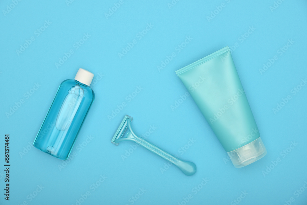 Feminine shaving set on blue Feminine shaving set on blue