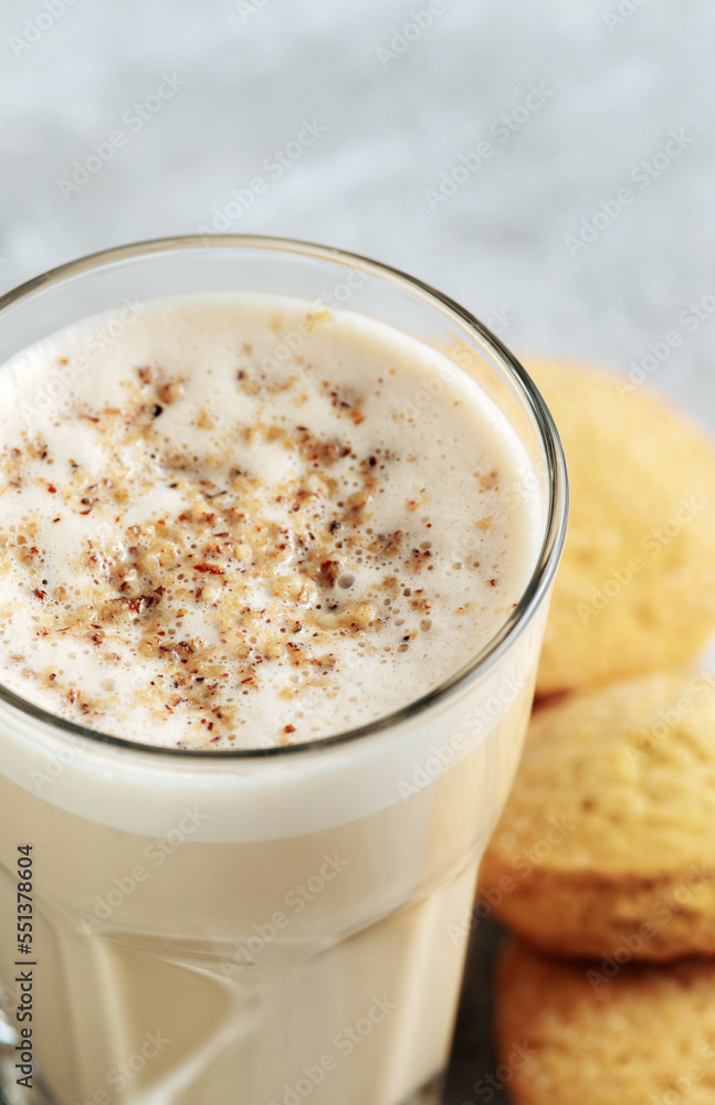 coffee with milk and grated nut in a glass close-up. Raff coffee coffee with milk and grated nut in a glass close-up. Raff coffee