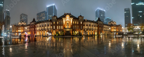 Japan architecture. Tokyo attractions. Building of railway station. Excursions to cities of Japan. Tokyo in rainy weather. Japanese city in autumn evening. Tokyo architecture. Tour of Japan