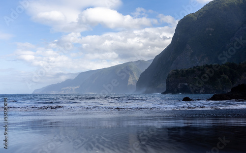 black sand beach of Madeira view on mountains