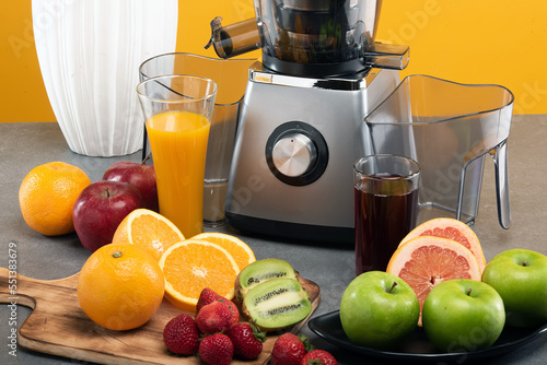 electric juicer extractor on non-isolated background  photo