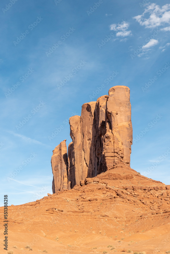 scenic view to monument valley with camel butte and blue sky