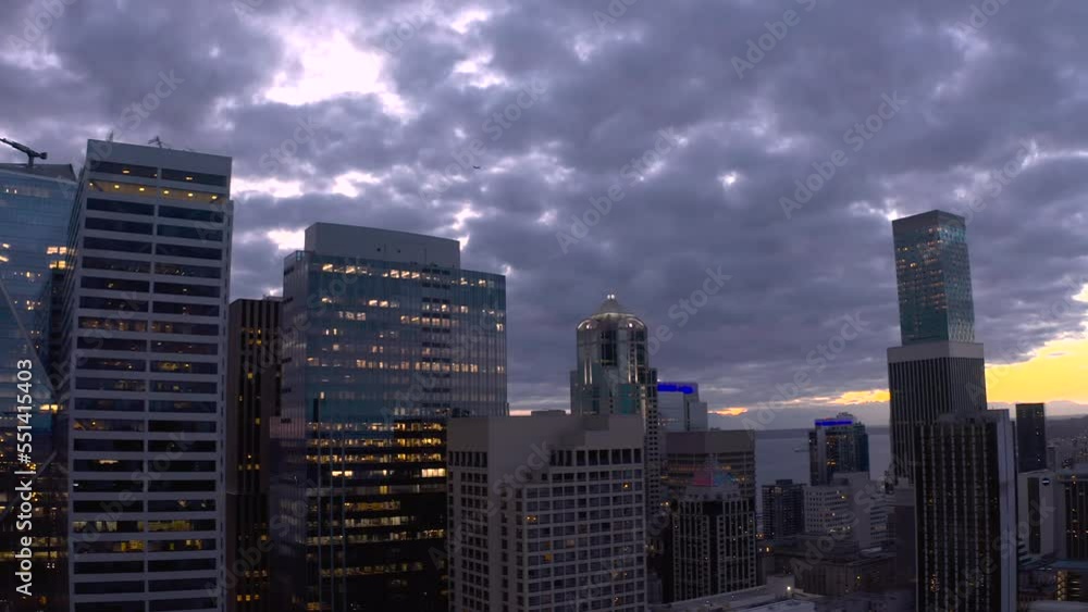 Aerial view of Seattle's skyscrapers during a stormy sunset. Aerial view of Seattle's skyscrapers during a stormy sunset.