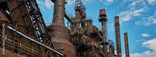 Panoramic rusting Tanks and pipes running for miles inside the closed and abandoned Bethlehem Steel works in Bethlehem Pennsylvania