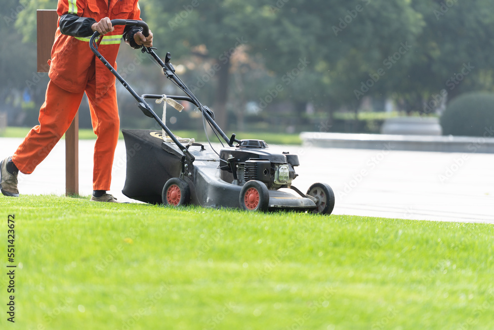 worker is mowing worker is mowing