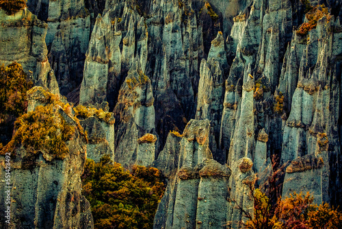 The Putangirua Pinnacles which are a geological formation that consist of a large number of huge earth pillars or hoodoos . Part of The Lord of the Rings was filmed on location here photo